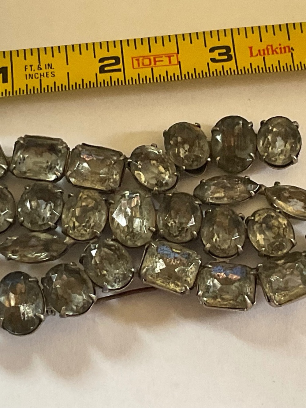 VINTAGE  BROOCH  4 in . Grey stones